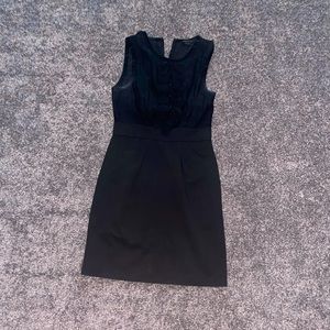 Black Bcbg maxazria dress used size 4 ruffles on front zipper in back w pockets